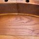 Round extendable dining table stripped in cherry wood Louis XVI René Trotel 1