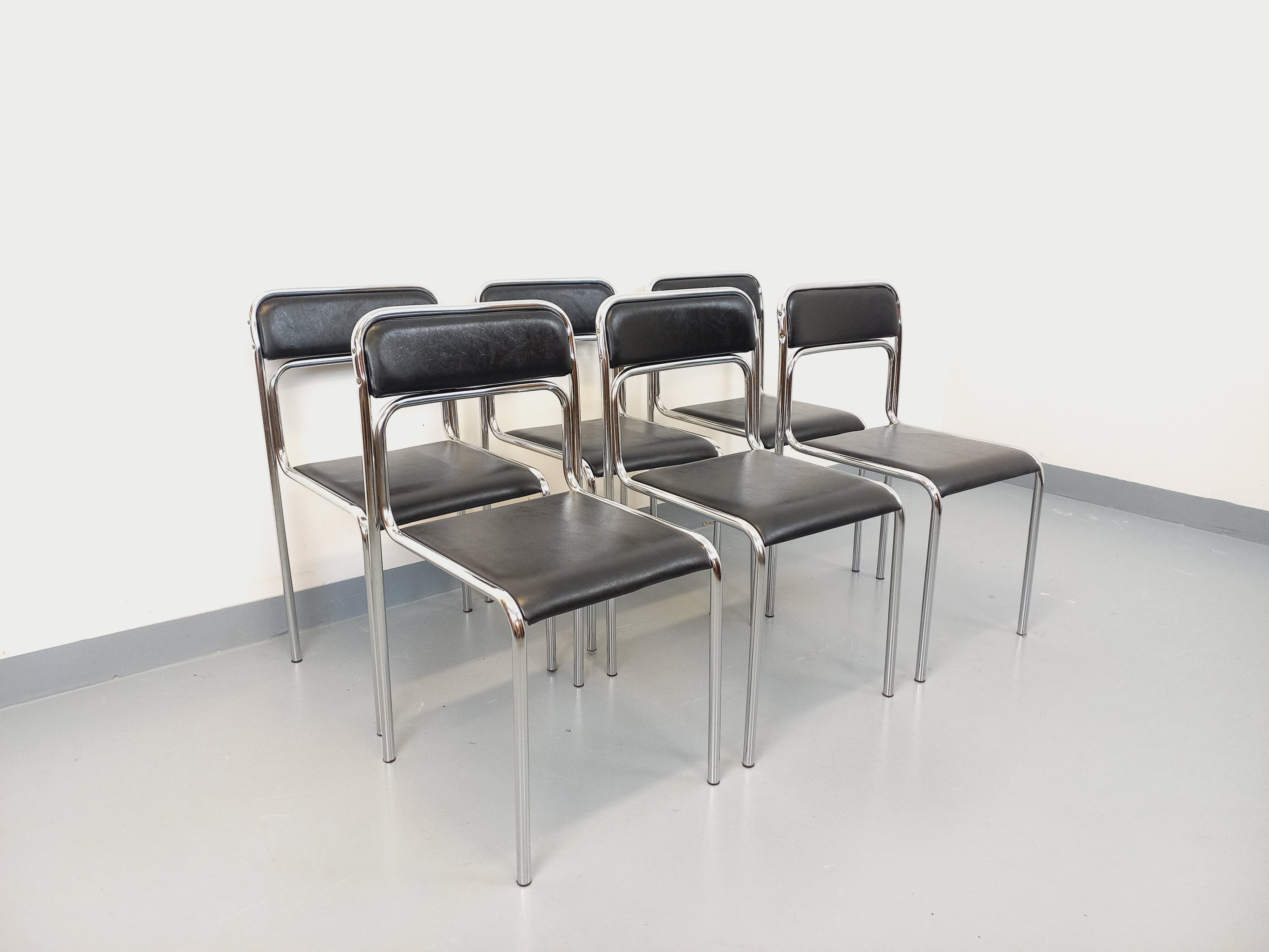 Set of 6 vintage Italian stackable chairs in chrome metal and skai.