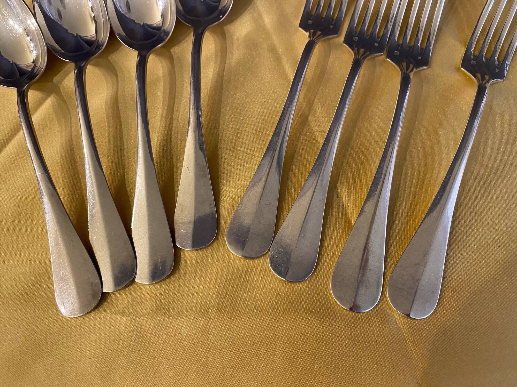 Series of 4 silver metal cutlery uniplat net model spoons forks