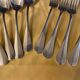 Series of 4 silver metal cutlery uniplat net model spoons forks