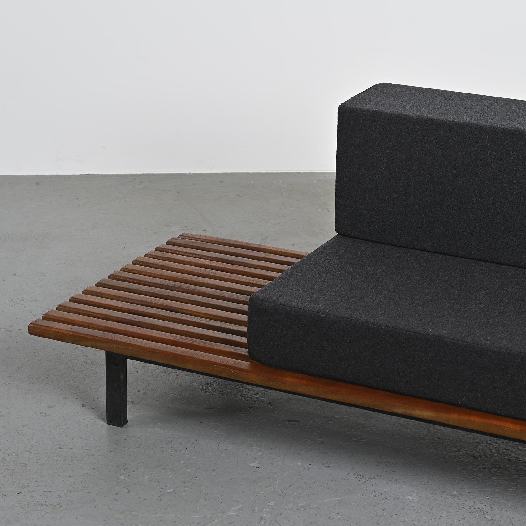 Cansado mahogany bench by Charlotte Perriand, circa 1962.