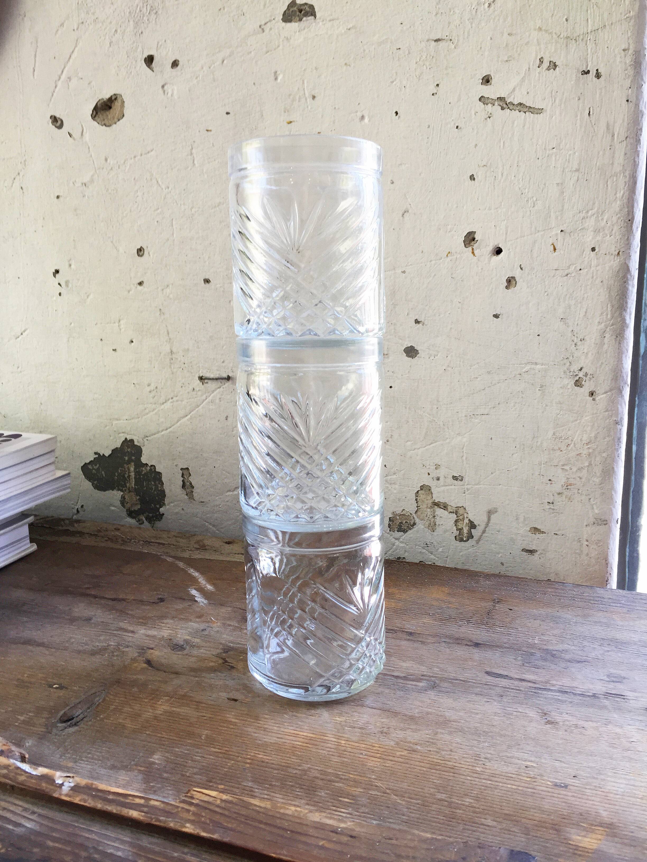 3 old chiseled glasses