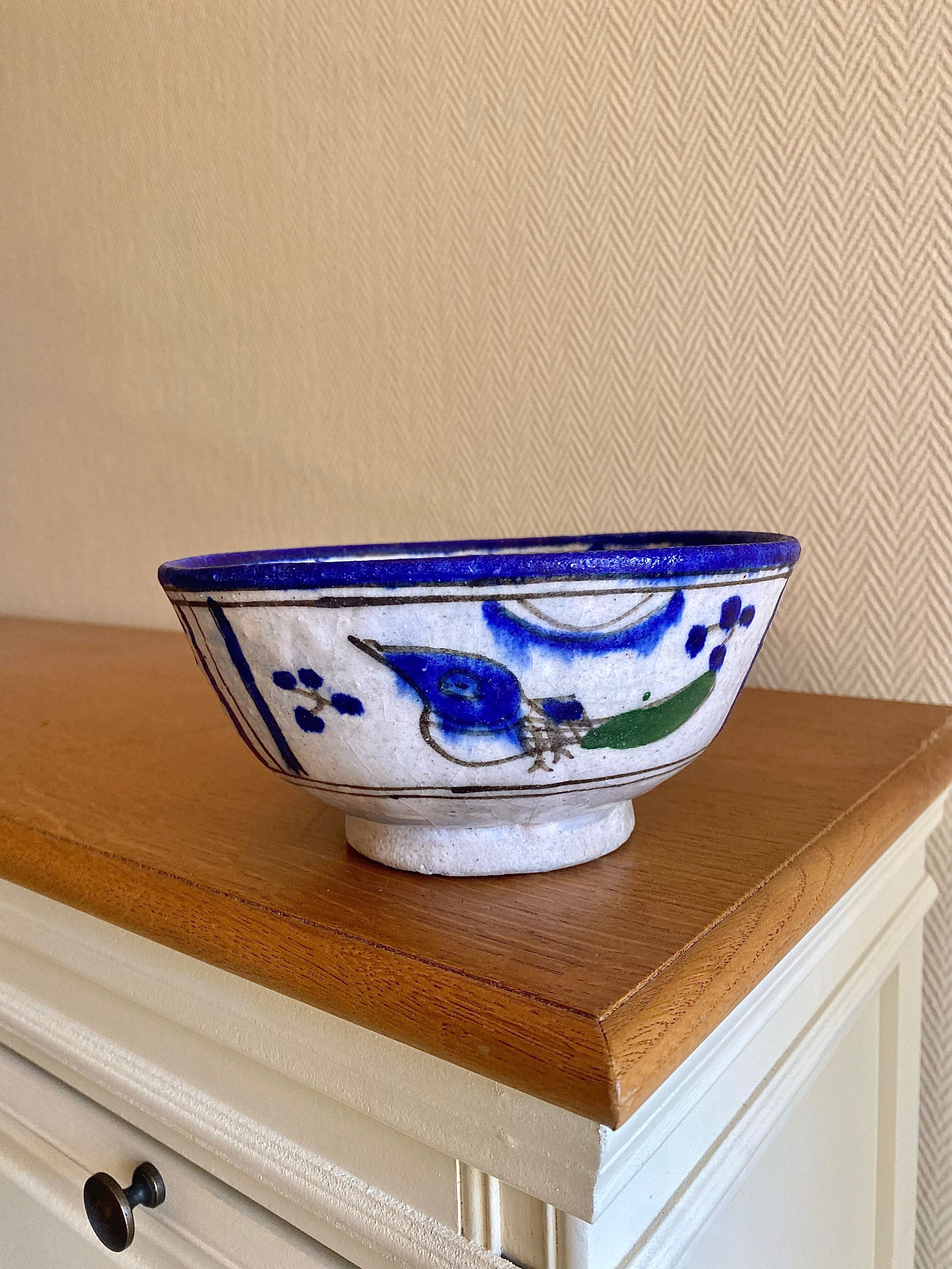 Ancient Persian ceramic bowl in Qajar style.