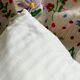 Cushion in hand-embroidered hemp.
