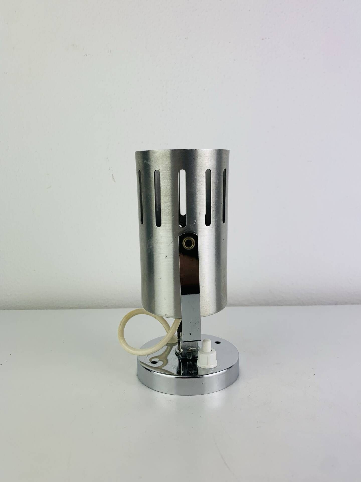 Aluminor wall light, brushed aluminium and chrome, 1960s.