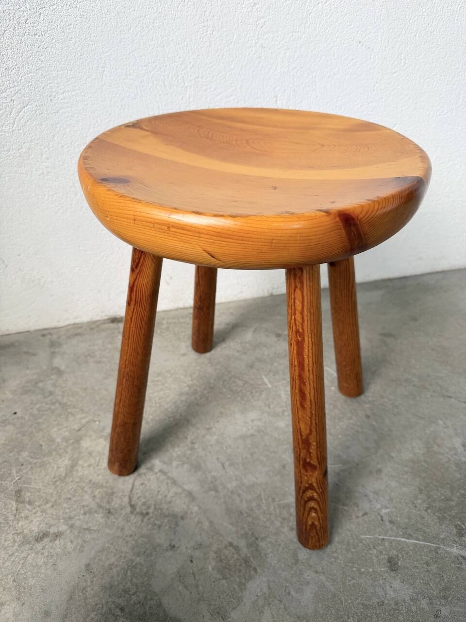 Pine stool assigned to Charlotte Perriand for Les Arcs.