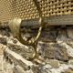 Gold metal mesh wall coat rack