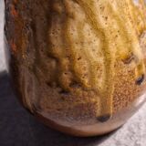 Stoneware vase with flowing pattern