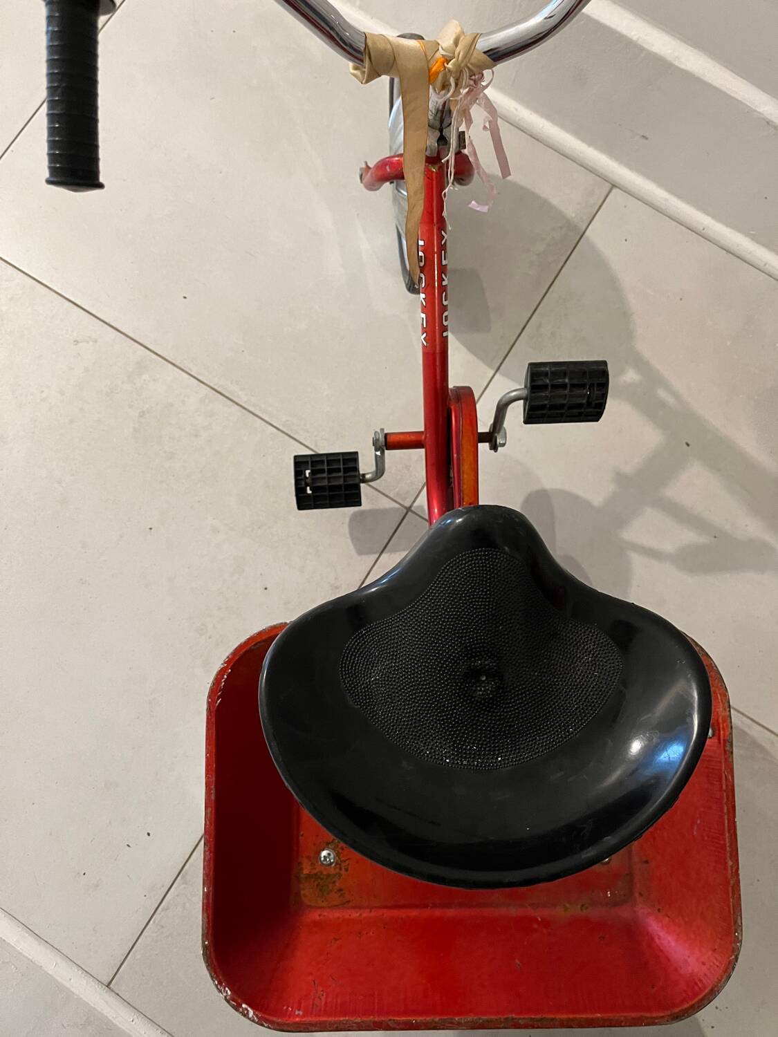 Vintage metal jockey tricycle