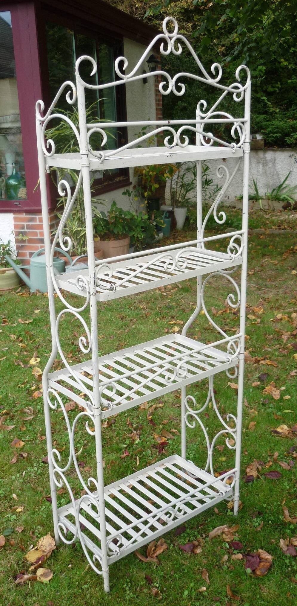 White wrought iron folding shelf