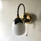 Black and gold wall light with white opaline flower, Italy 1990.