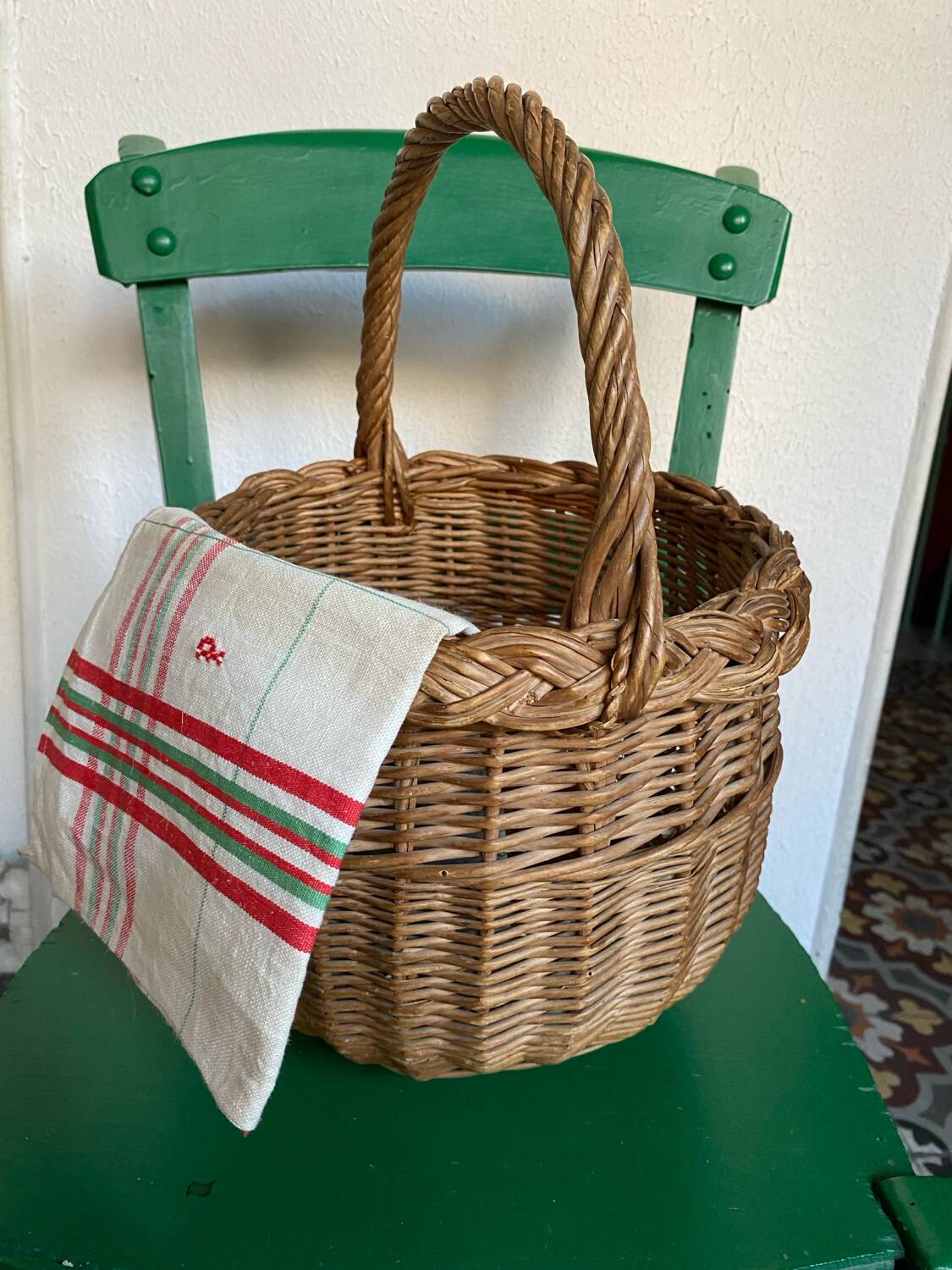 Round wicker basket in a bohemian style.