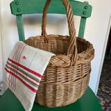 Round wicker basket in a bohemian style.