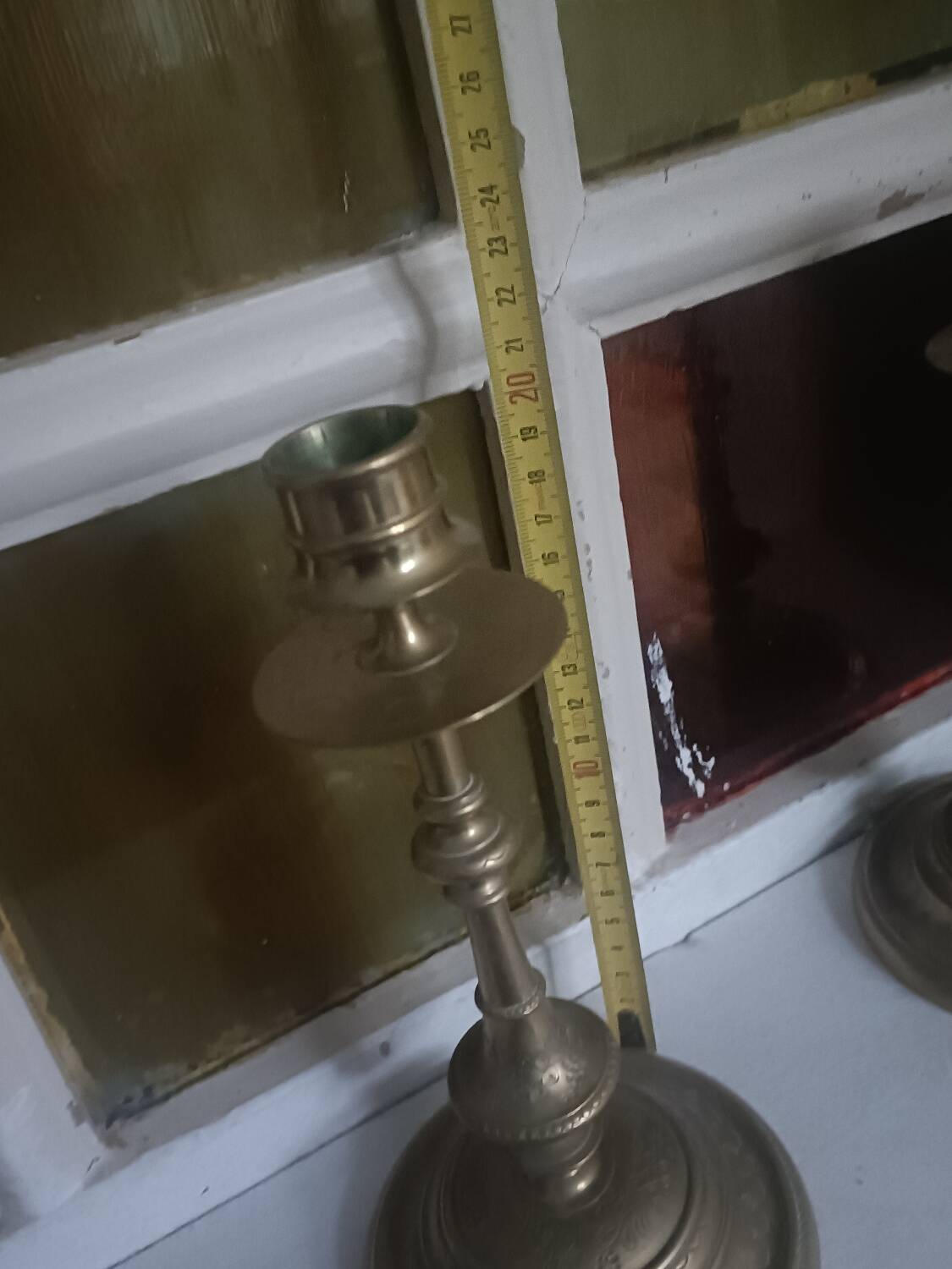 Pair of chiselled candlesticks