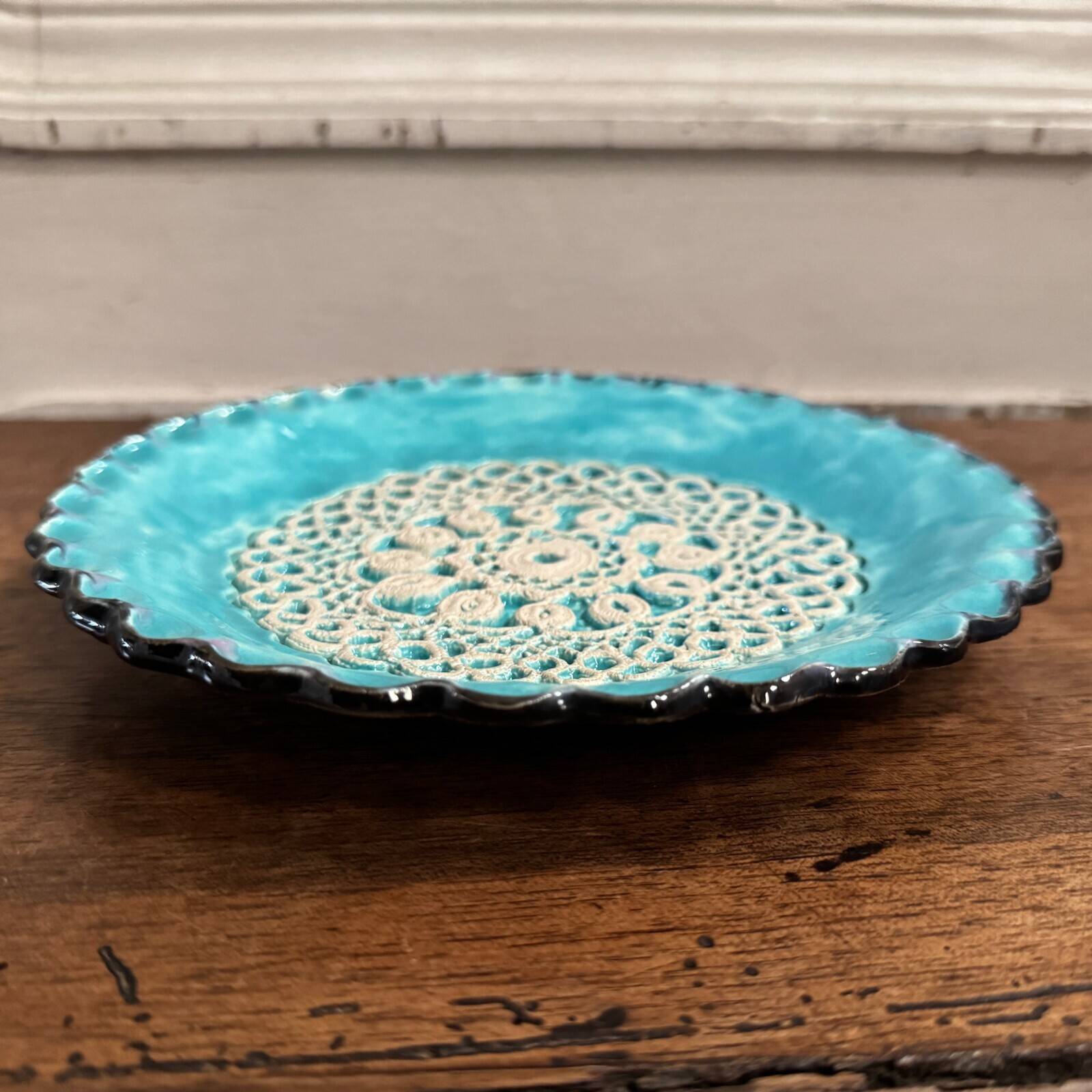 20th century blue enamel plate decorated with lace