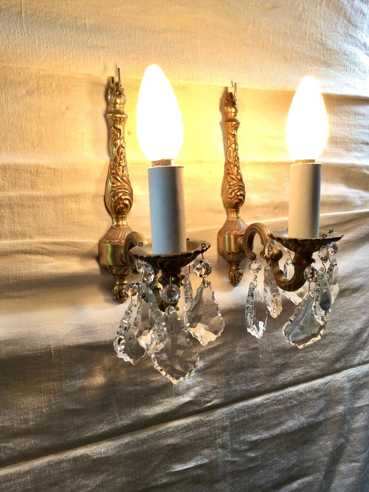 Pair of 1-light bronze sconces and Louis XV style stamps