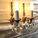 Pair of 1-light bronze sconces and Louis XV style stamps
