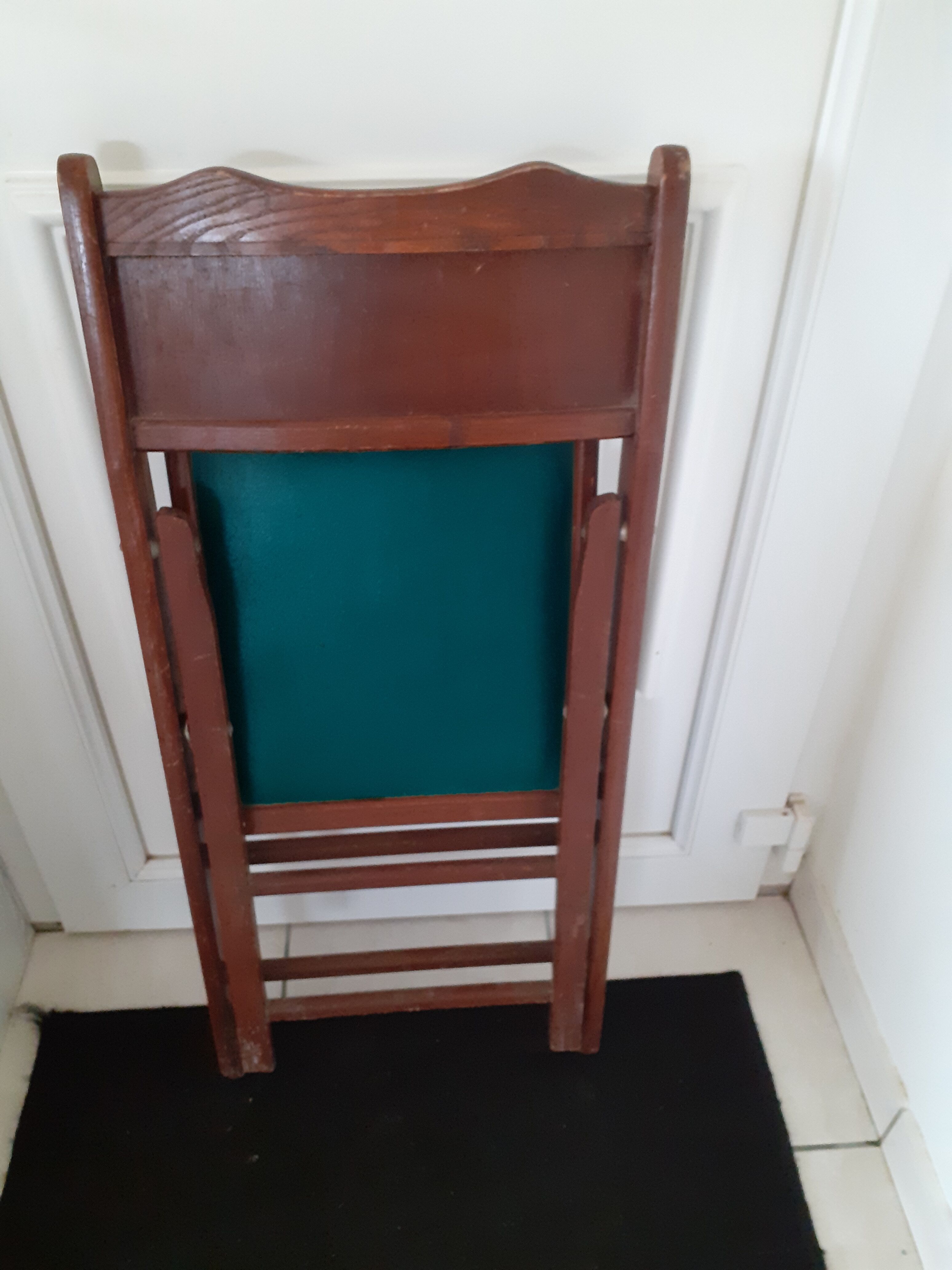 2 folding wooden and skai chairs, 60s