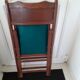 2 folding wooden and skai chairs, 60s