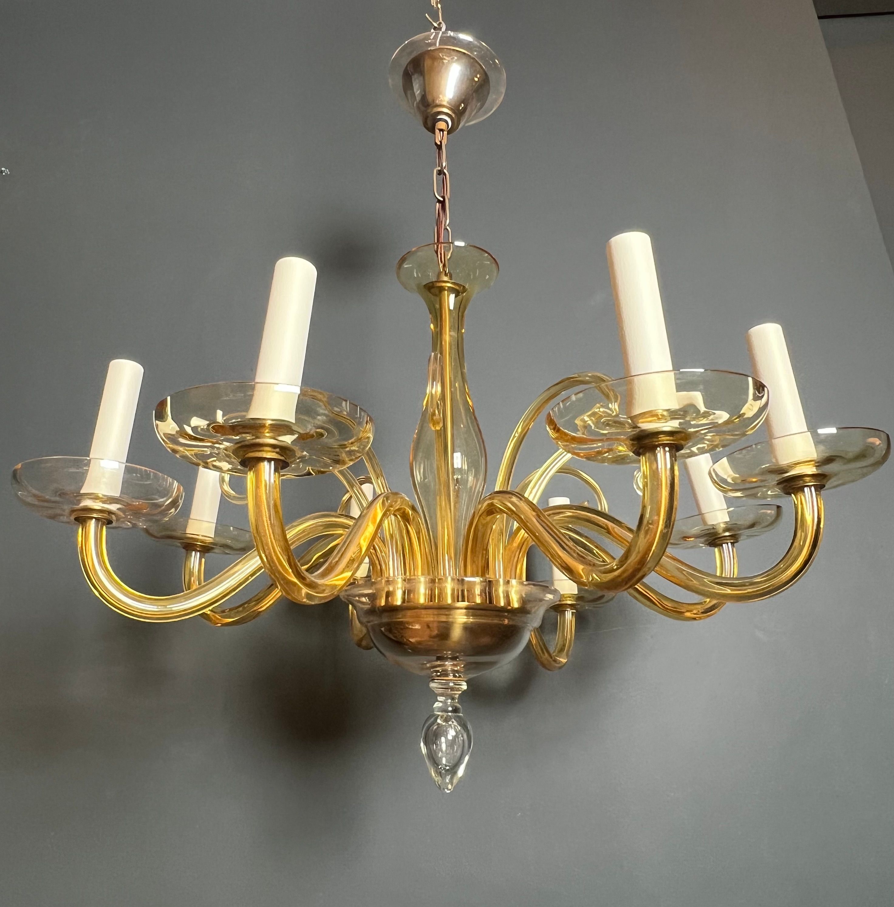 Orange Murano crystal chandelier with 8 light arms. Italian work. Circa 1970.