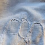 Old hand-embroidered linen sheet