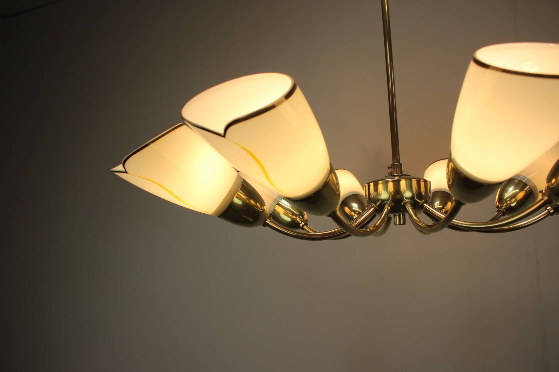 Brass and glass ten-arm chandelier from the mid-century, 1960s.