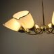 Brass and glass ten-arm chandelier from the mid-century, 1960s.