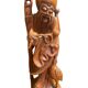 Carved wooden table lamp representing a man