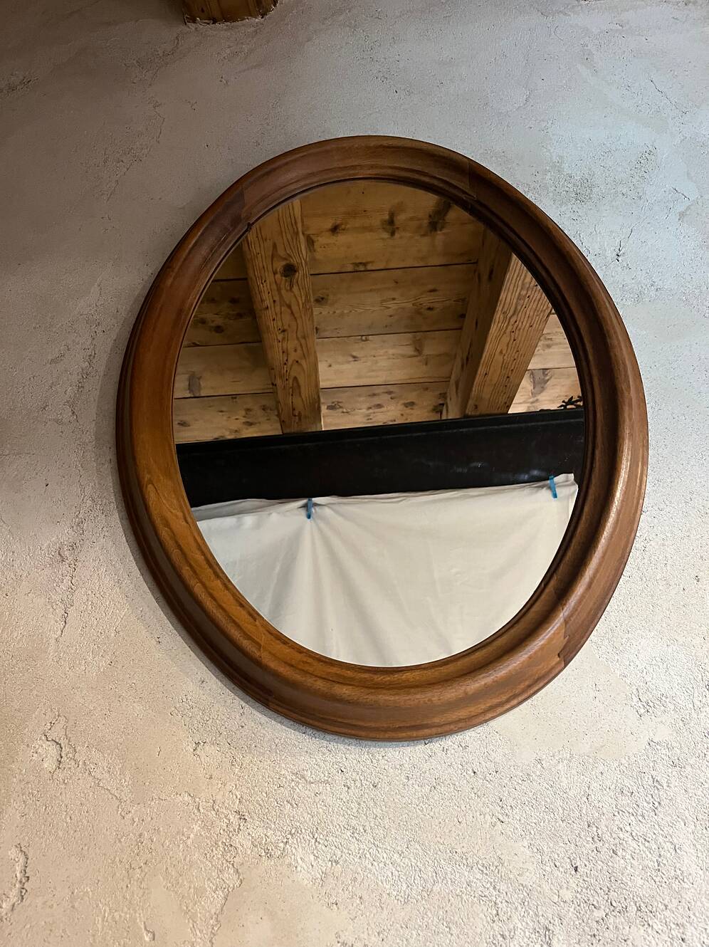 Antique oval walnut mirror