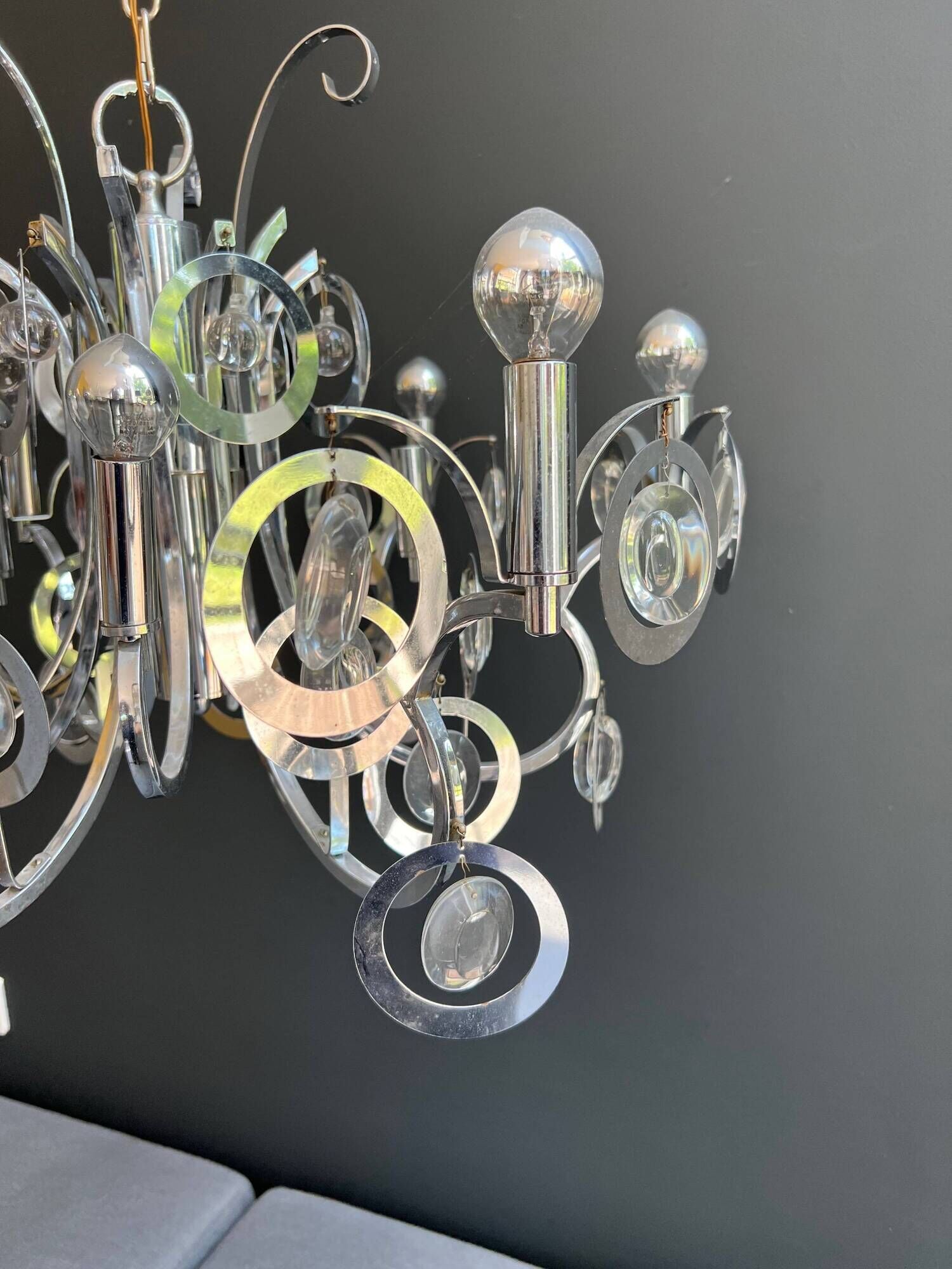 Chrome Metal Design with Swirls and Optical Glass Lenses. Tra