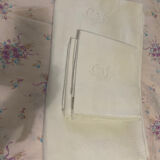 Tablecloth service and these monogram napkins CV