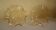 Two corolla-shaped lampshades for suspension or applique, amber colour