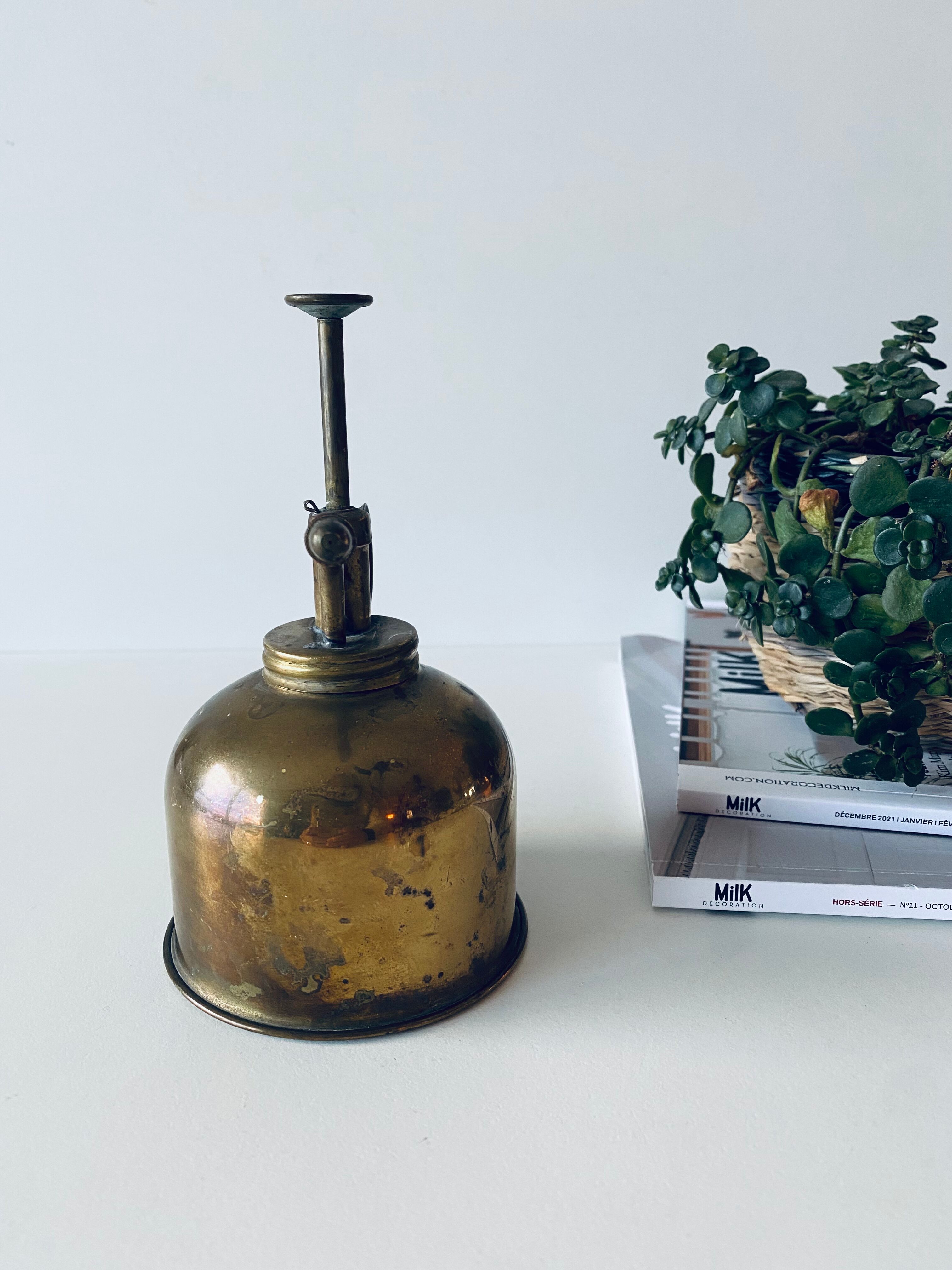 Old brass mist for indoor plants