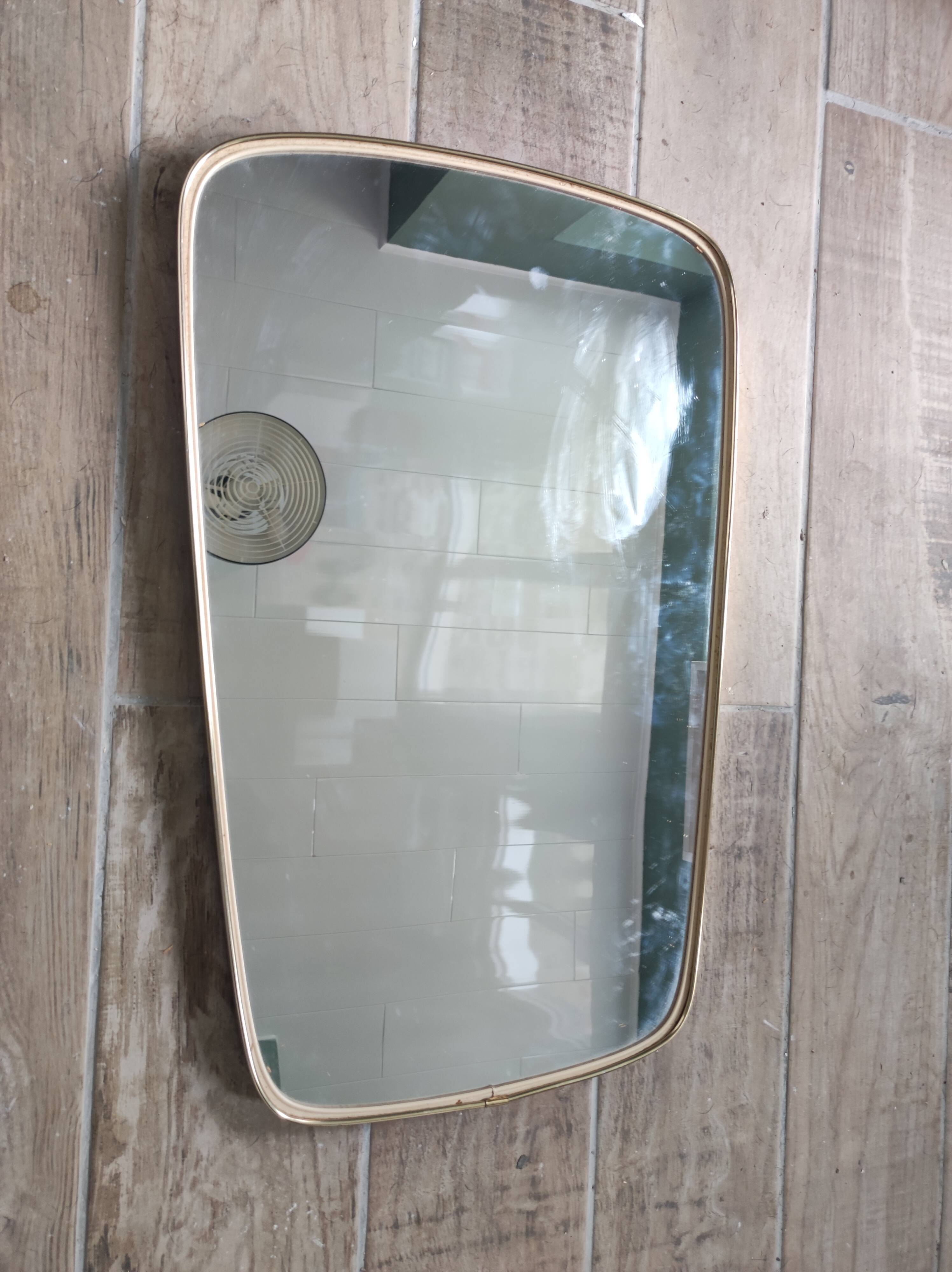 Asymmetrical mirror free-form rearview mirror