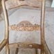 Oak rocking chair with a straw seat.