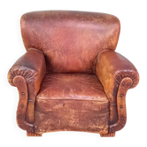 Leather nailed armchair