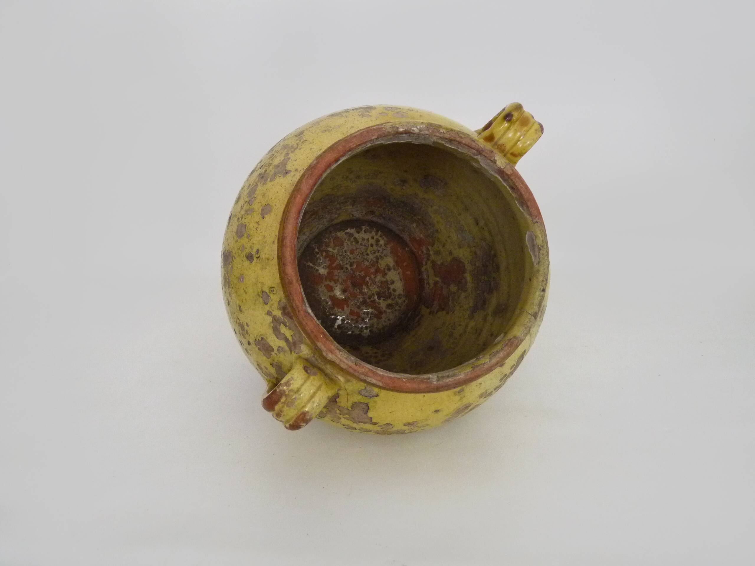 Magnificent glazed yellow confit pot, south-west of France. 19th century.