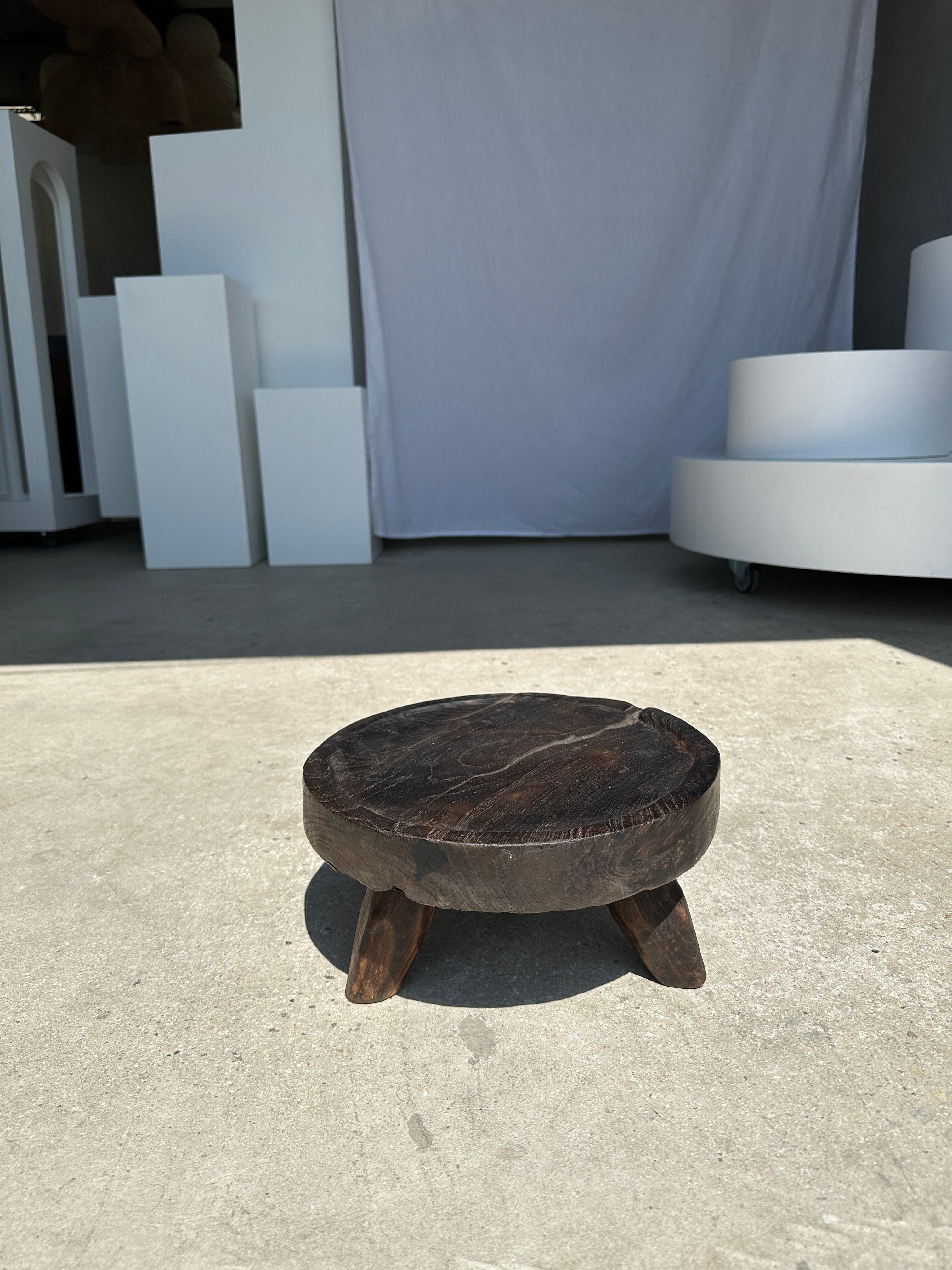 Small tripod stool low in dark brown upcycled teak