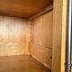 Wardrobe / Solid wood storage unit with one door.