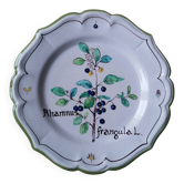 Hand-painted botanical faience plate signed Miles