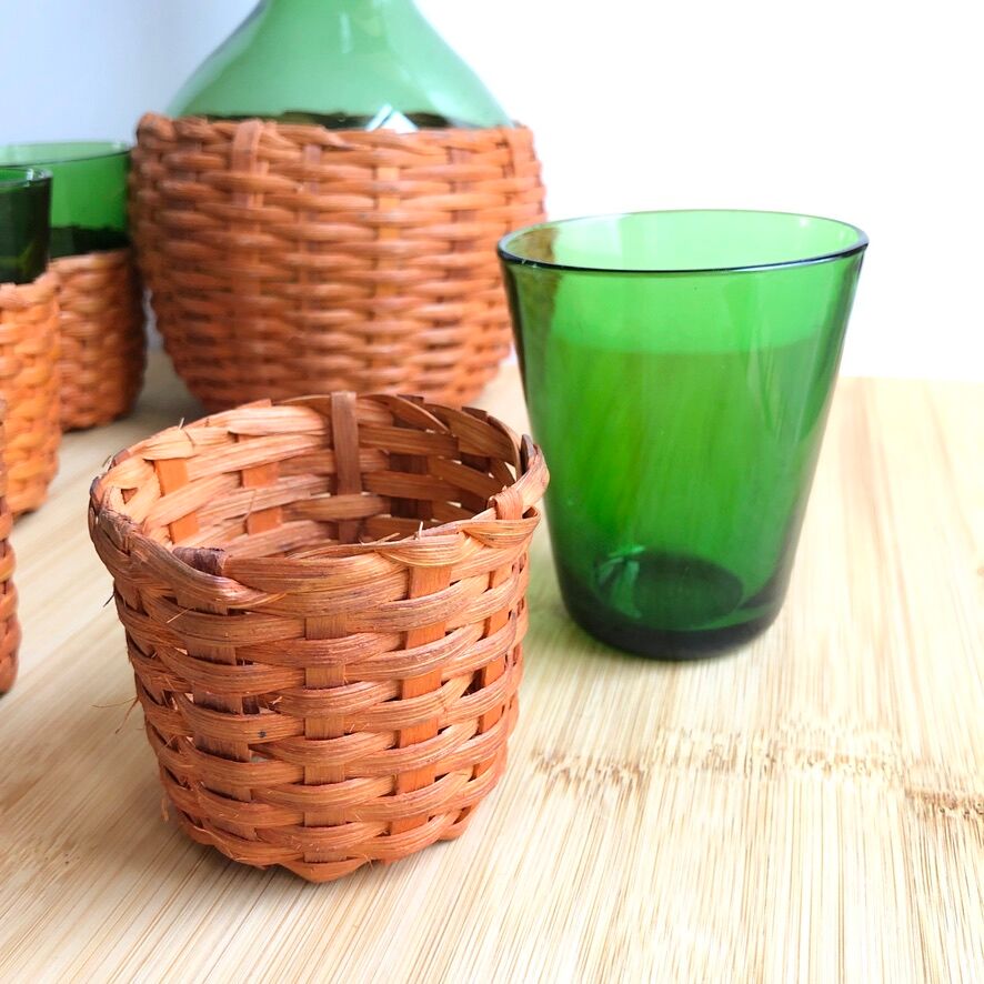 Service carafe and vintage glasses, with wicker