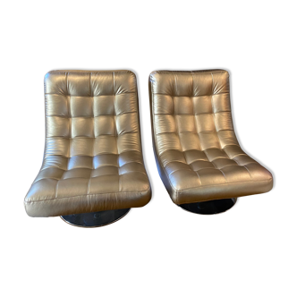 Pair of leather design armchairs