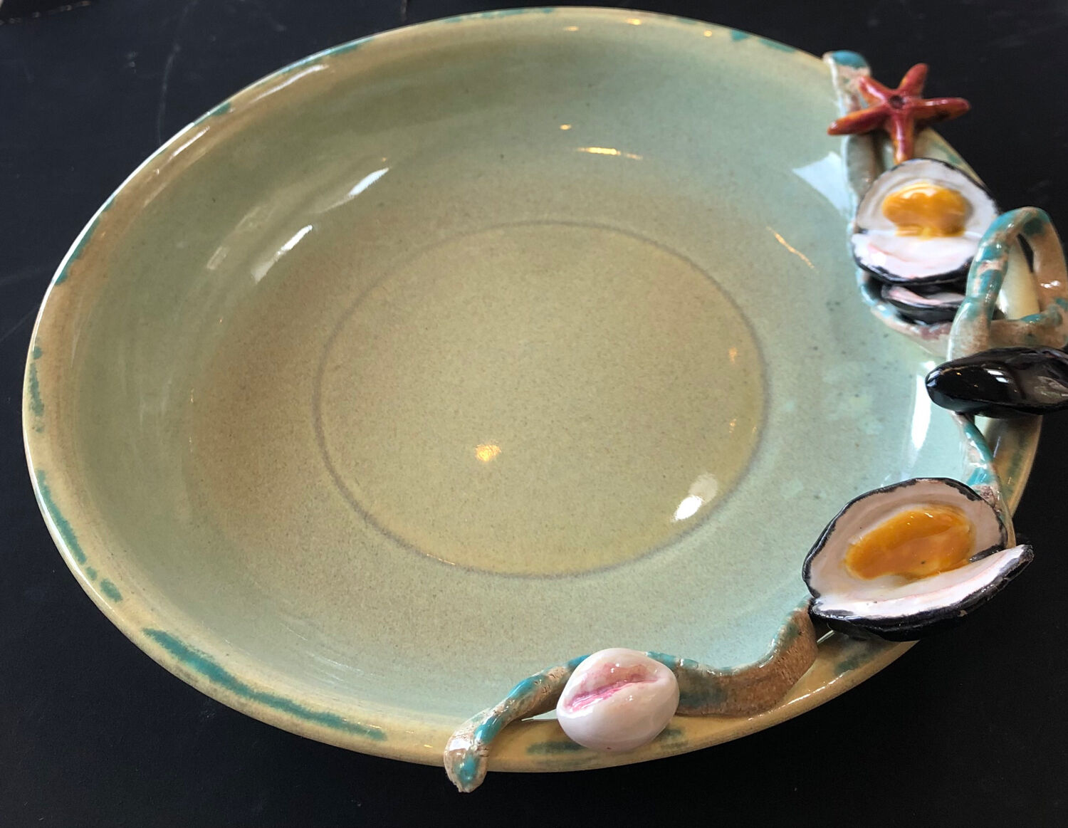 Paris ceramic dish with slip decoration, by Suzy Coste