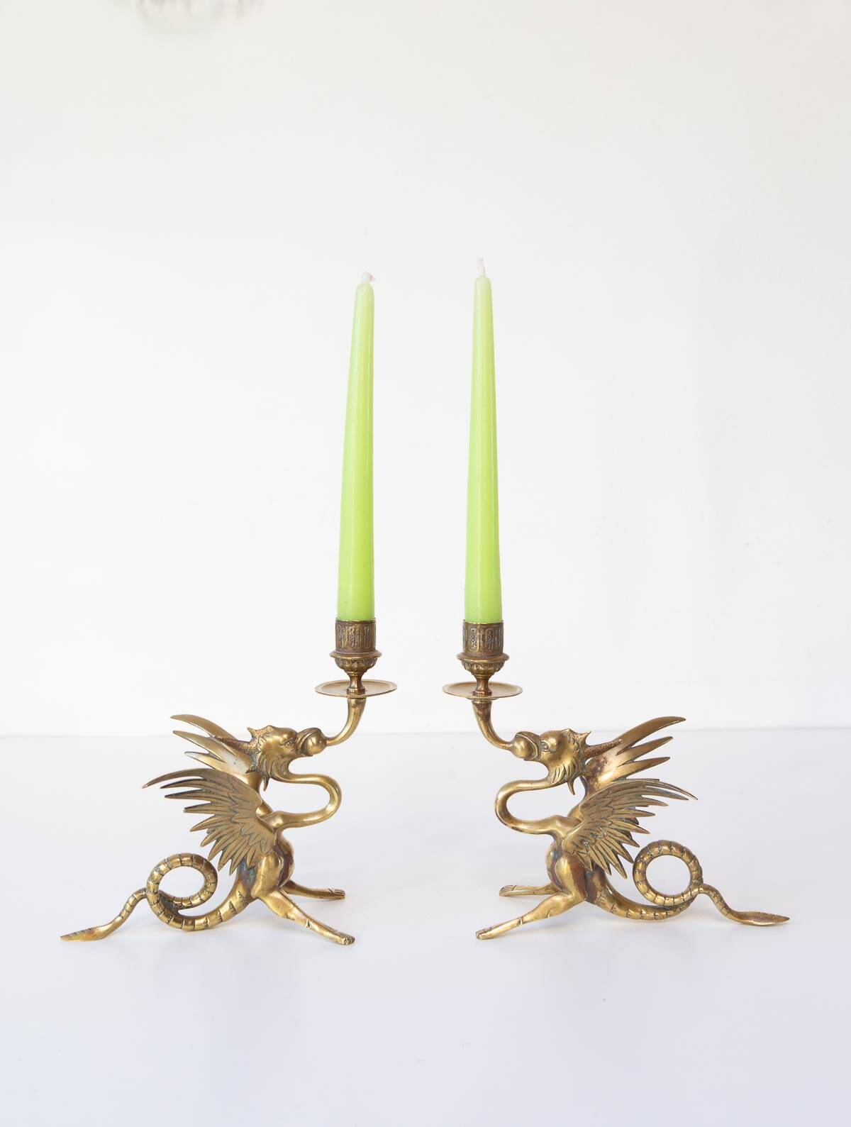 Pair of 19th century gilded brass “chimera” candlesticks
