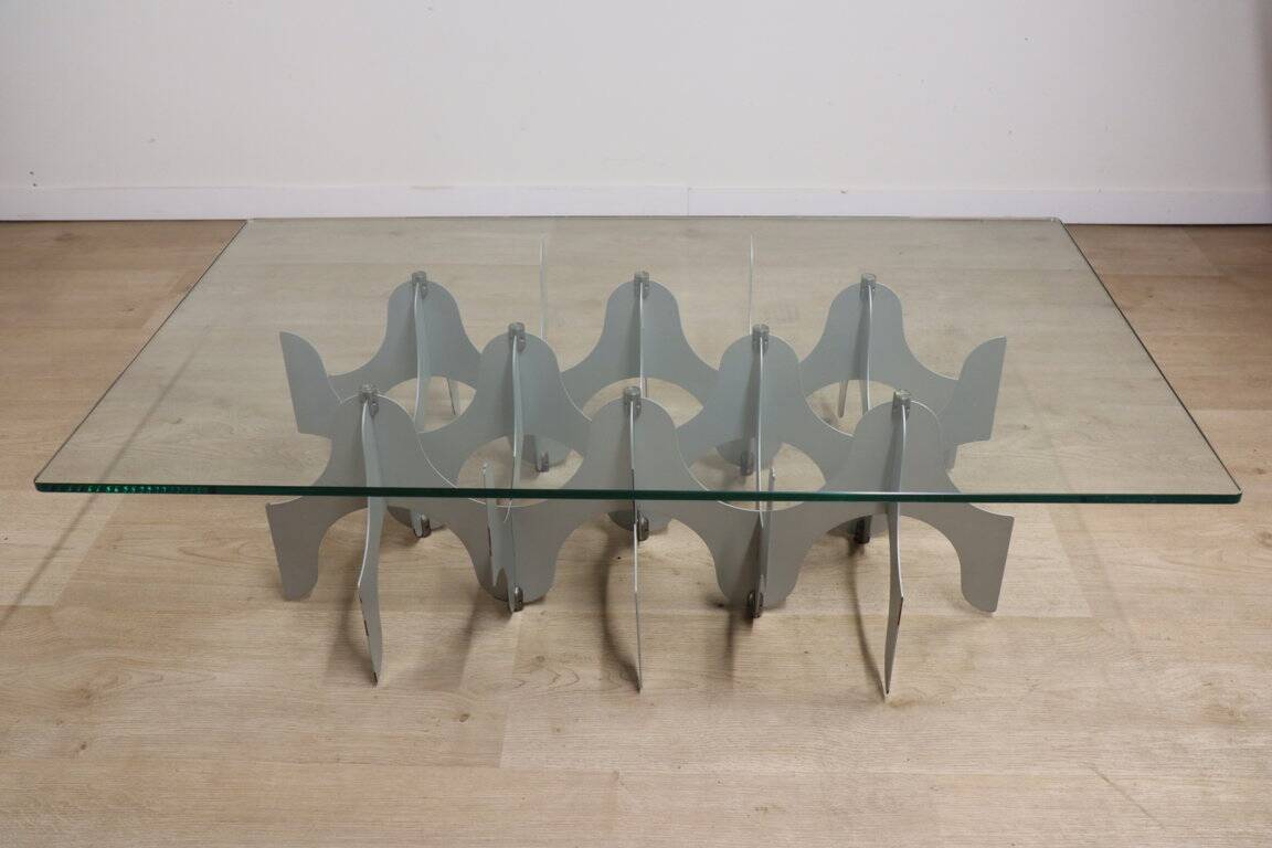 Minimalist sculptural coffee table in metal and glass