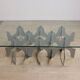 Minimalist sculptural coffee table in metal and glass