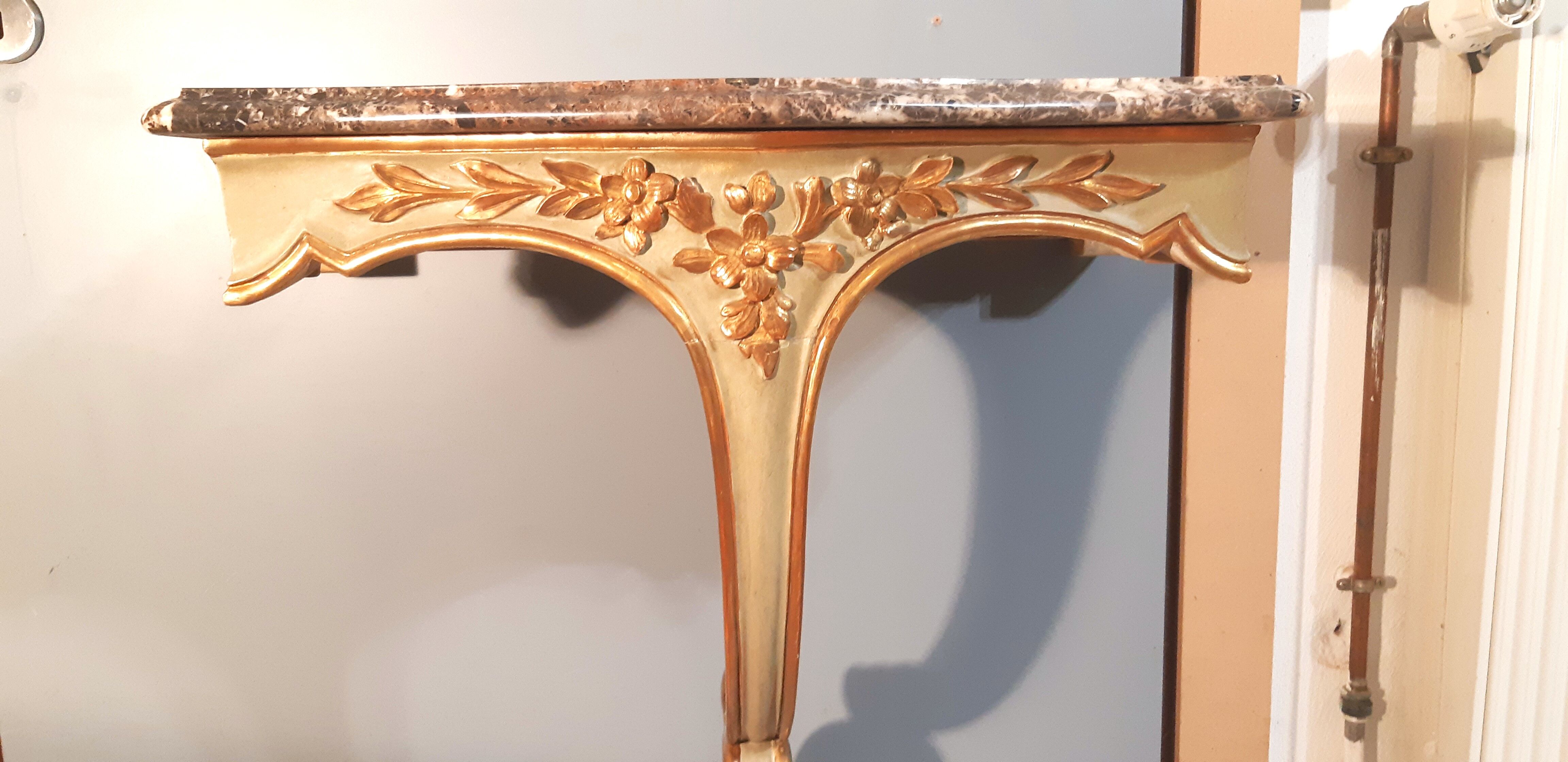 Louis XV style wall lamp console, twentieth century, wood and gilded stucco marble top