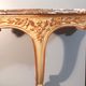 Louis XV style wall lamp console, twentieth century, wood and gilded stucco marble top