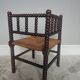 Turned wooden corner chair