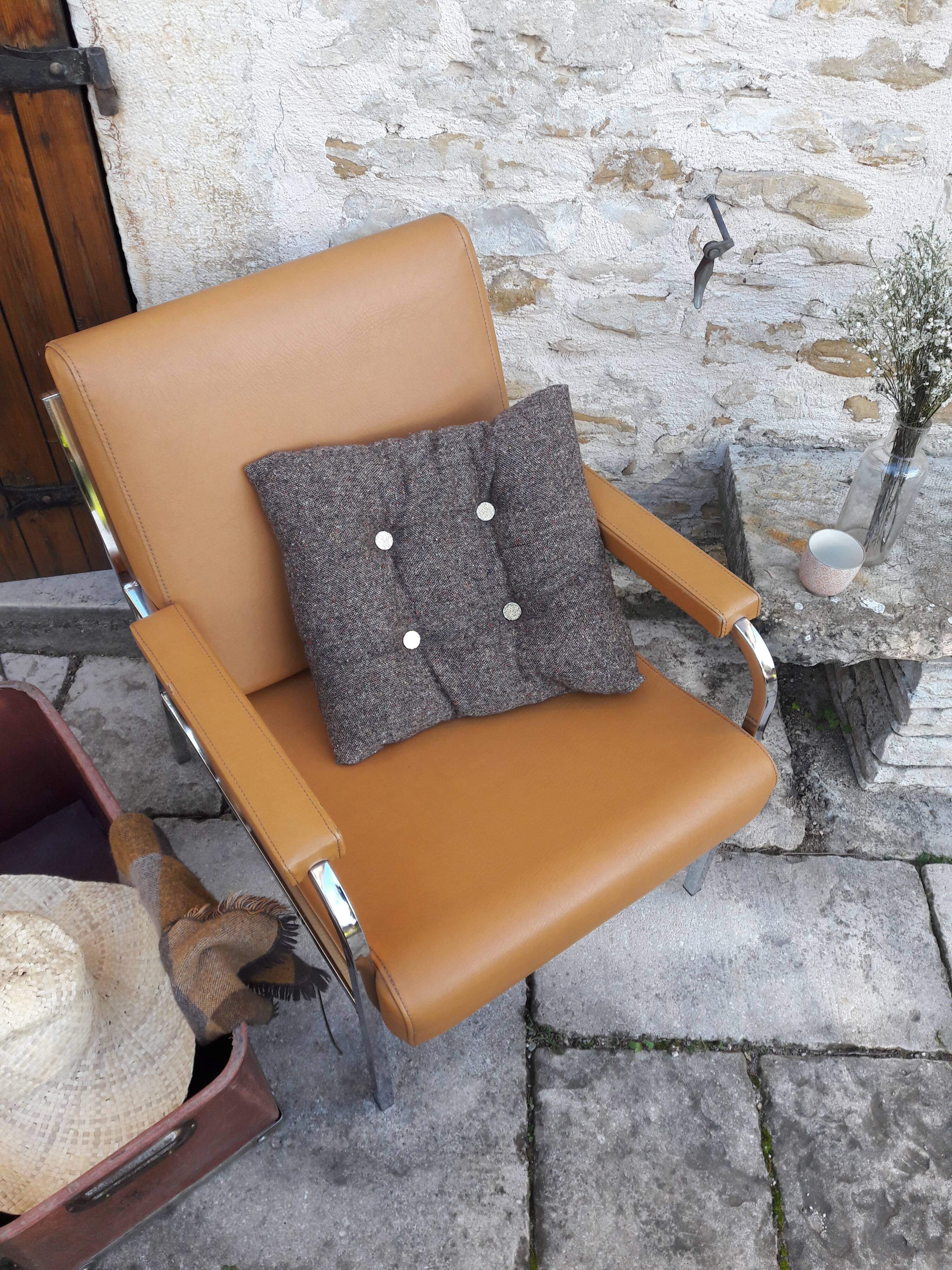Fauteuil acier chromé et skaï